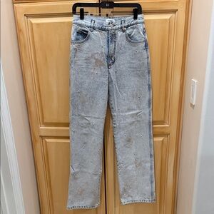 Women’s Light Blue studded Jeans. Featuring floral prints. Purchased in Paris!